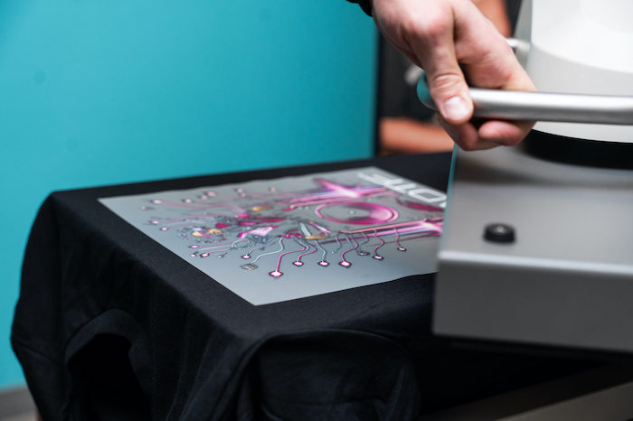 Insta Graphic Systems Ultima Split Finish heat transfer featuring combined matte and gloss effects on a custom apparel graphic